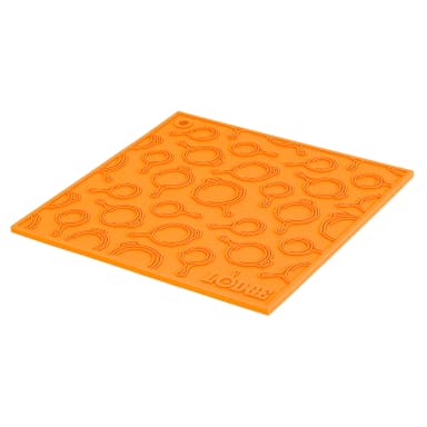 Lodge AS7SKT61 Orange 7" Silicone Trivet with Skillet Pattern