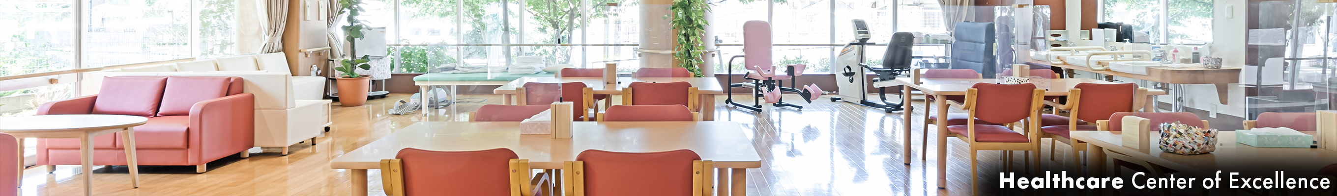 healthcare worker supporting seniors having breakfast