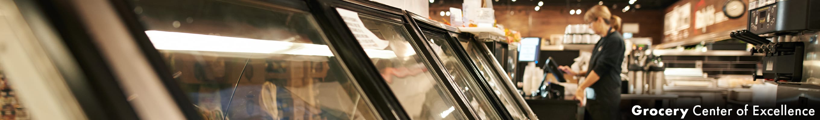 two cooks in striped apron, cooking in a restaurant, fire rising off the skillet in a heated bout of cooking