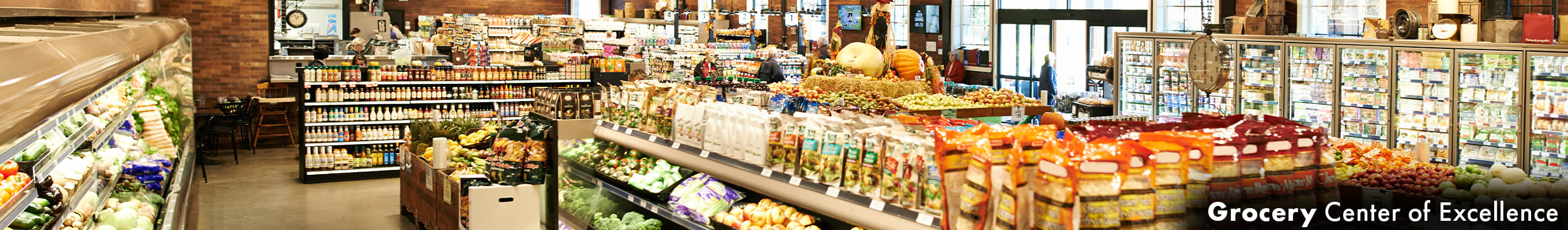 two cooks in striped apron, cooking in a restaurant, fire rising off the skillet in a heated bout of cooking