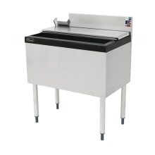 The Perlick TS36IC10-STK is a 36-inch wide modular freestanding underbar ice bin and cocktail unit. It features a dent-resistant ABS top ledge, a 10-circuit cold plate concealed under the bin liner, and a 10 3/4-inch deep stainless steel ice bin.