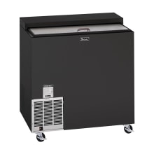 The Perlick FR36RT-BS-STK is a glass cooler designed for underbar installation. Its matte black vinyl coating complements surrounding hardware and bar elements, creating a cohesive appearance.